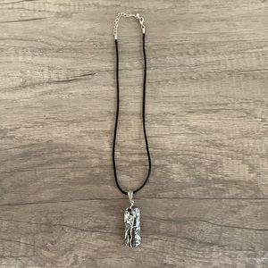 Black and silver necklace with pendant